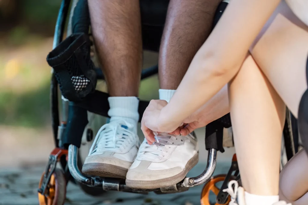 Close up of person tying shoes