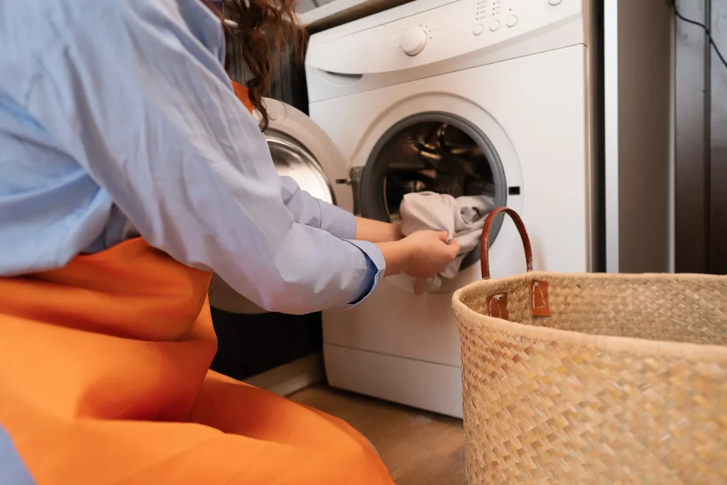 Close up of woman doing laundry
